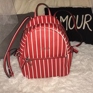 Red guess backpack with stripes